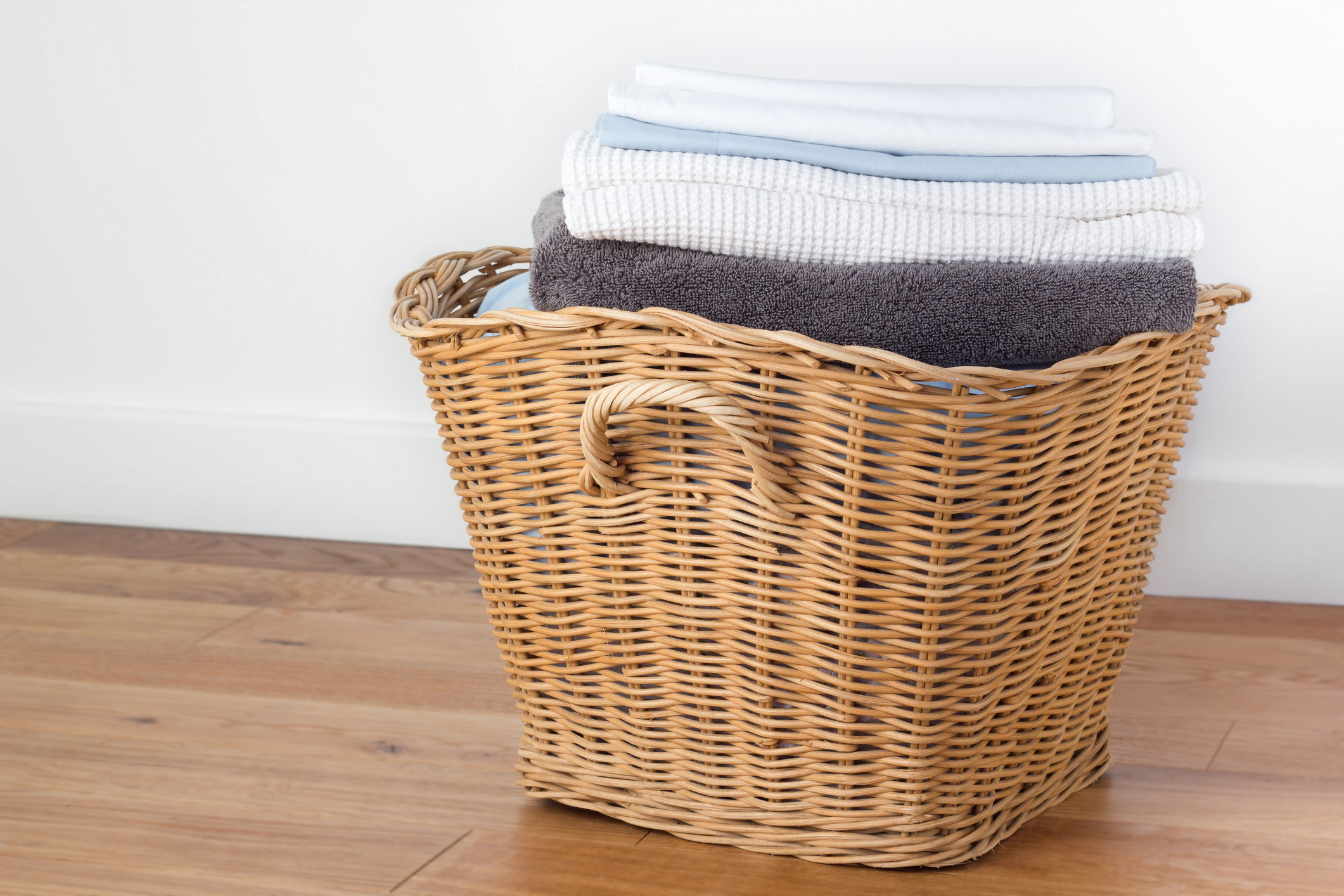Basket of Clean Towels and Sheets