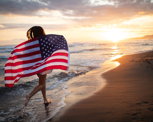 American Flag On Beach