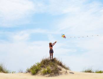 kite flying on beach bluff