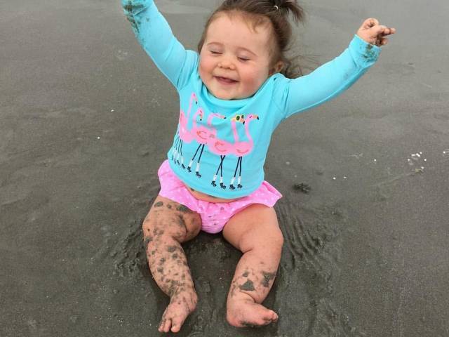 toddler at holden beach in the sand