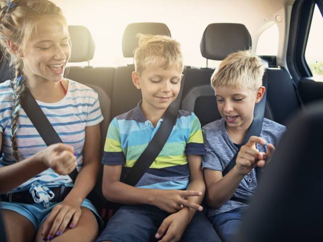 Kids Playing Games in Car