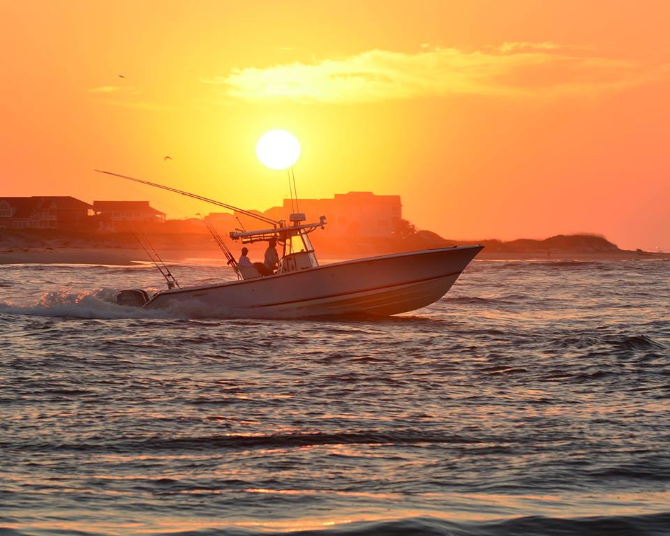 fishing boat at sunset